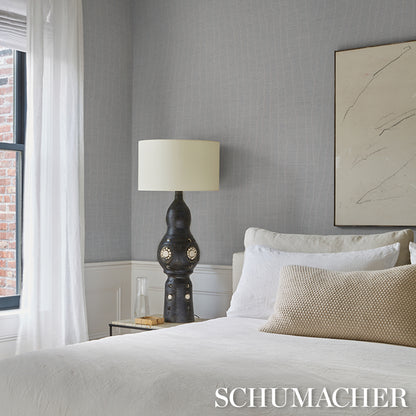 Whisper Blue wallcovering with a subtle pattern.