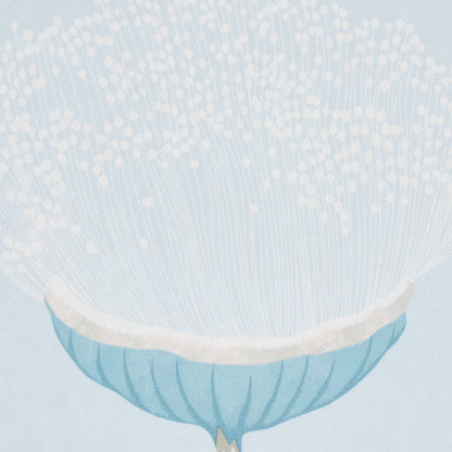 Pastel blue bowl with white rim, airy white filament bouquet with tiny beads radiating upward.