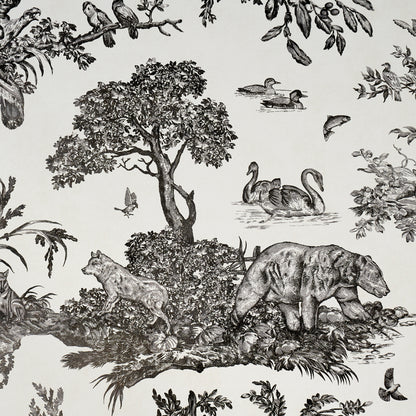 Monochrome toile print of woodland scene with trees, a wolf, a bear-like creature, swans, birds and foliage.