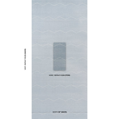 Light blue woven fabric with white zigzag stripes; centered darker blue fabric swatch on sample.