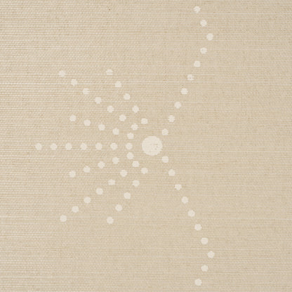 Beige linen-textured fabric featuring a white dotted starburst pattern; decorative upholstery or drapery fabric.