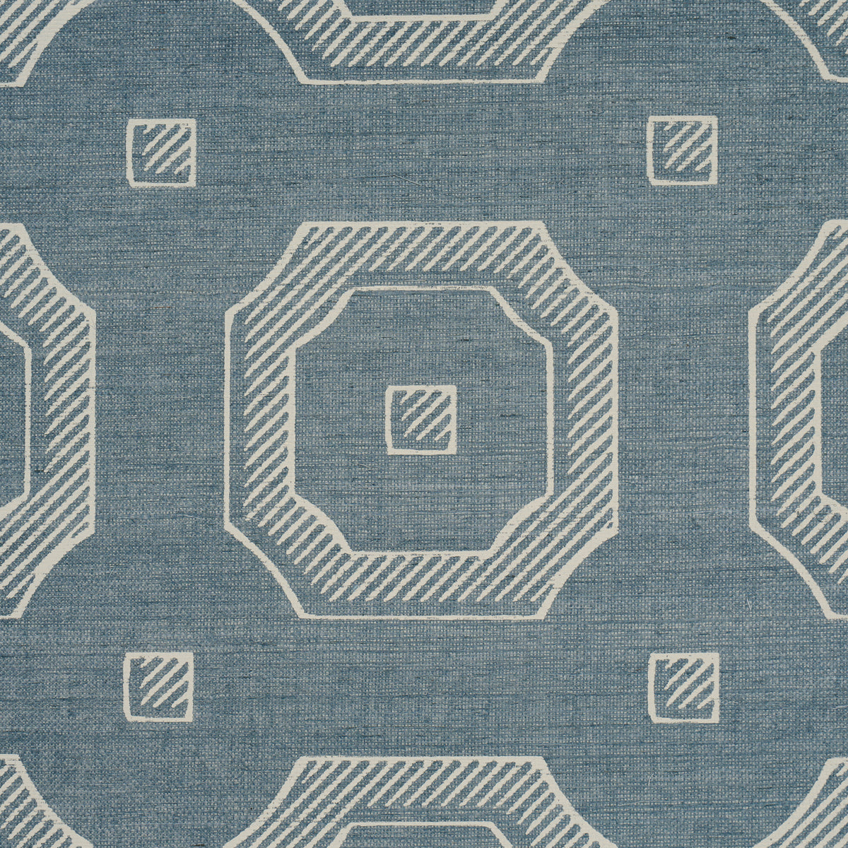 Blue woven fabric with white outlined octagon shapes and small square accents.