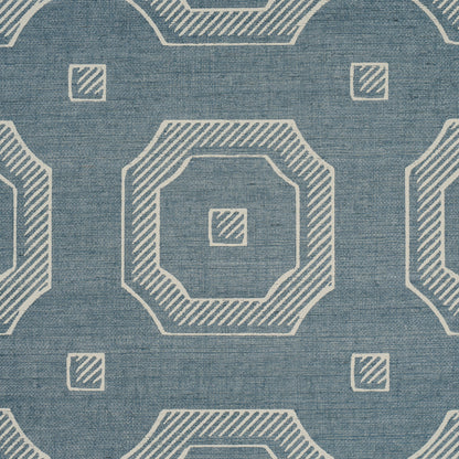 Blue woven fabric with white outlined octagon shapes and small square accents.