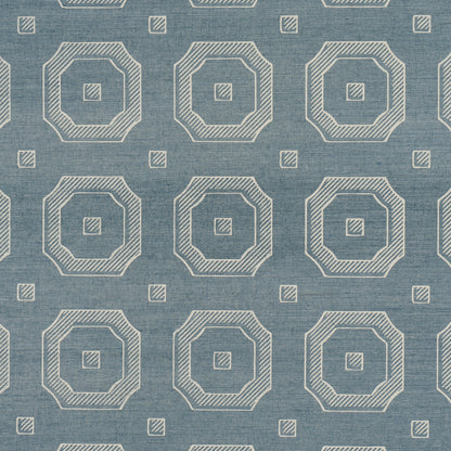 Blue denim-like textured wallcovering with beige striped nested octagons and small squares in a repeating geometric pattern.