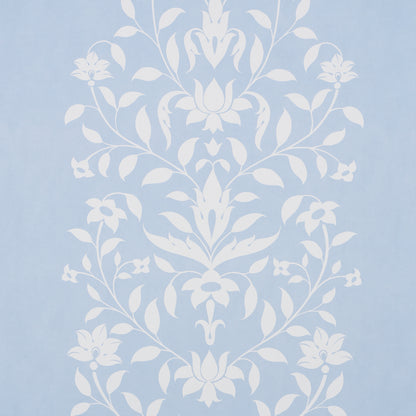 Light blue wallpaper with white damask floral pattern, ornate symmetrical vines & blossoms.