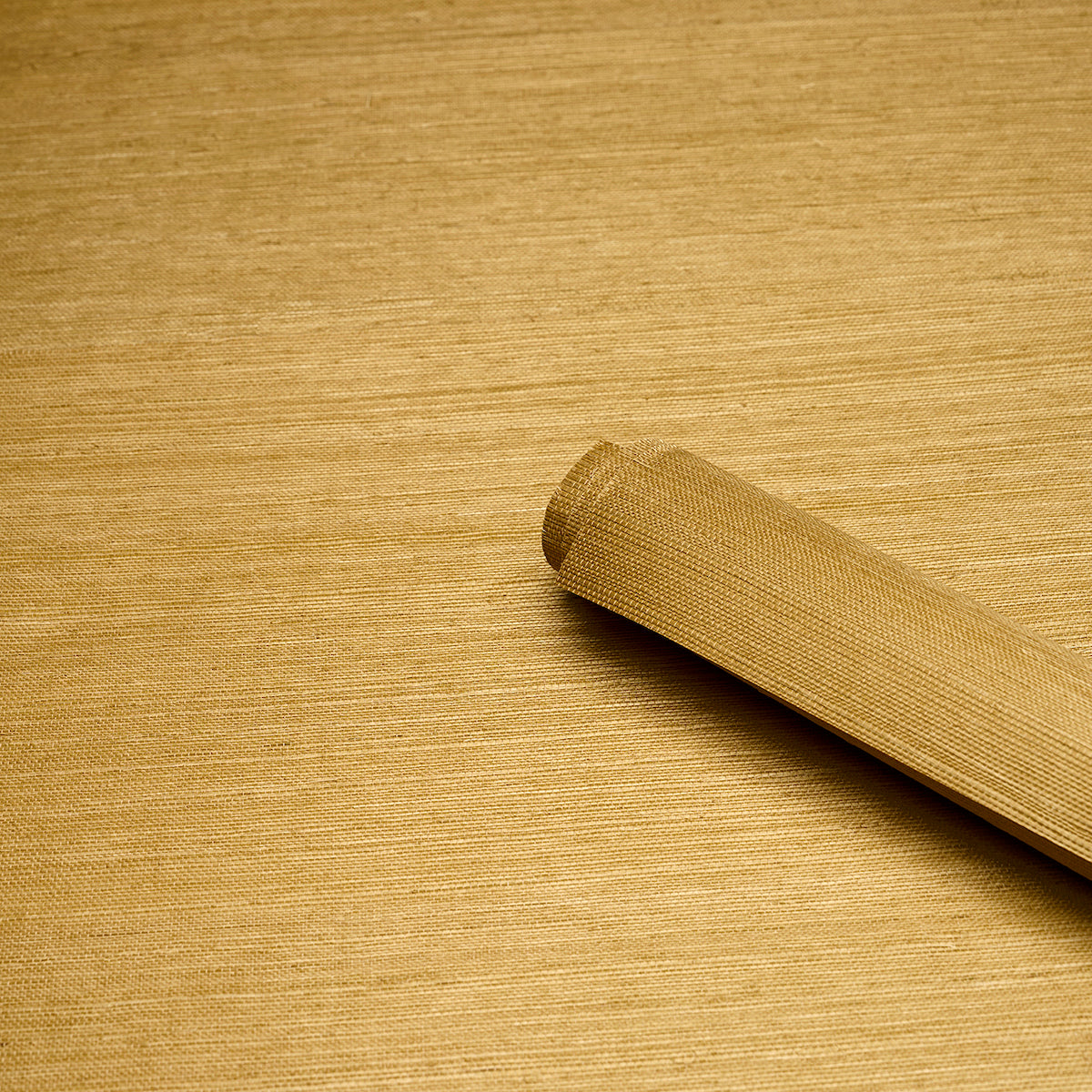 Backdrop with warm sisal tanlines pattern, featuring a rounded wooden dowel laid diagonally across.