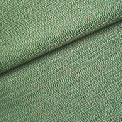sage green backdrop fabric close-up with a subtle woven texture and folded edge