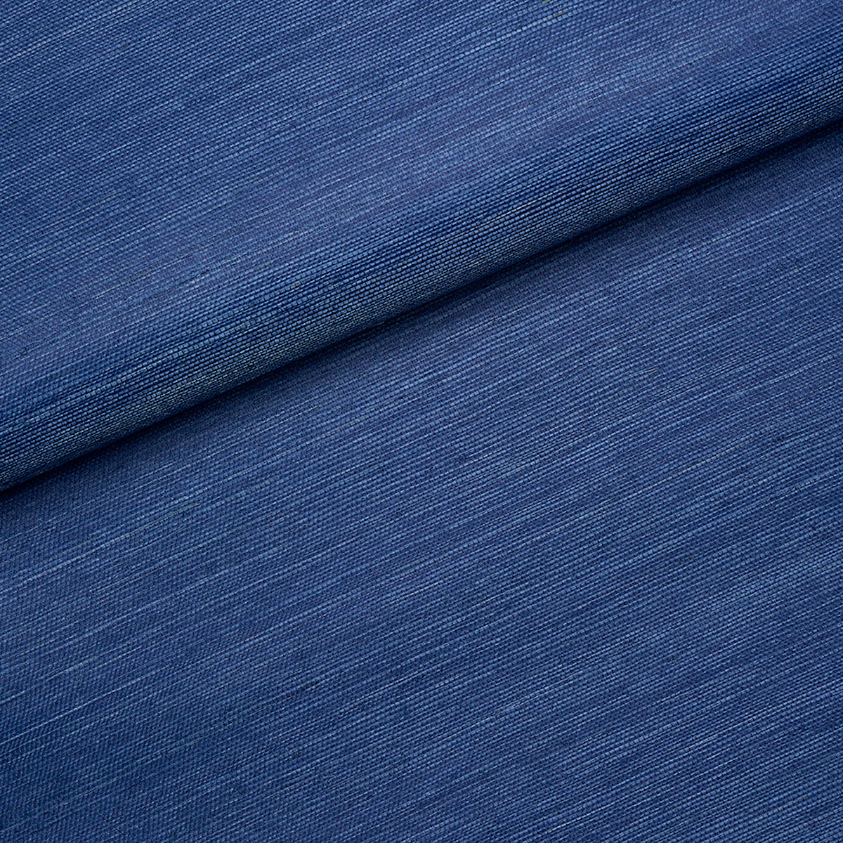 Blue backdrop fabric close-up with a folded edge.