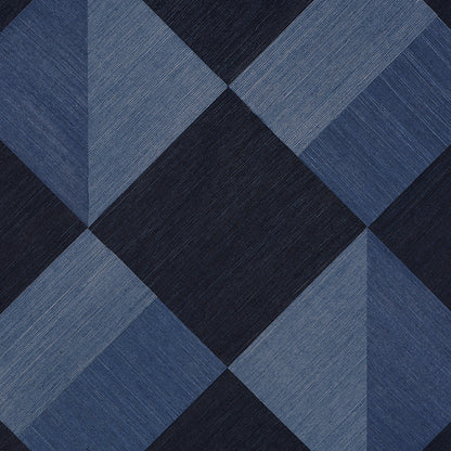 Blue denim-toned quilt fabric with large diamond pattern in navy and light blue hues, textured.