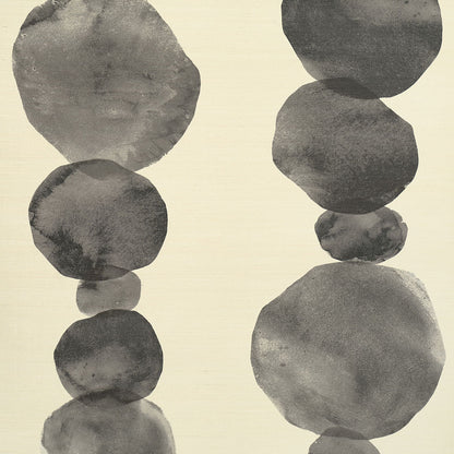 Minimalist abstract wallpaper pattern with pebble-like circles forming two vertical columns on an off-black background.