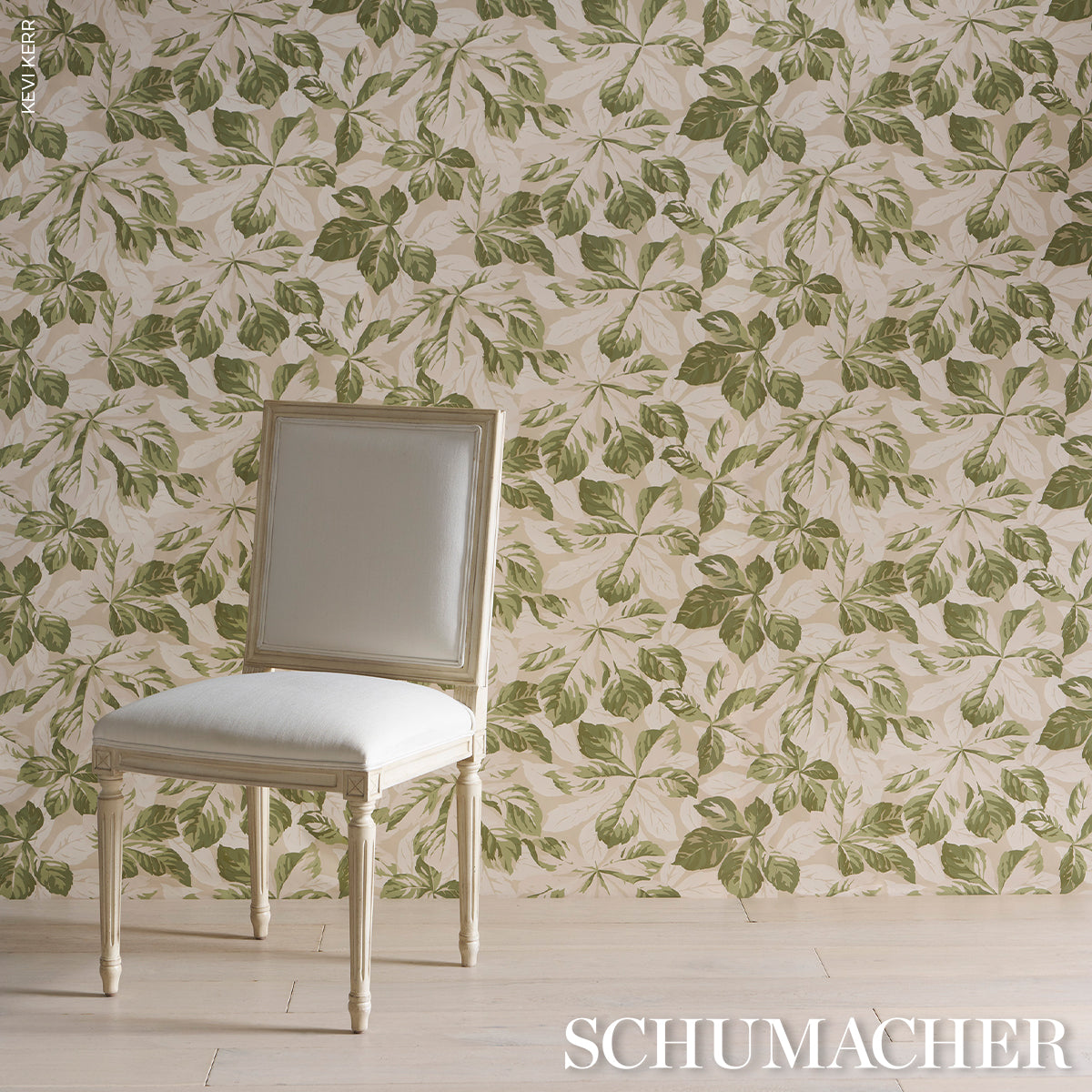 Cream wallpaper with a green leafy leaf pattern.