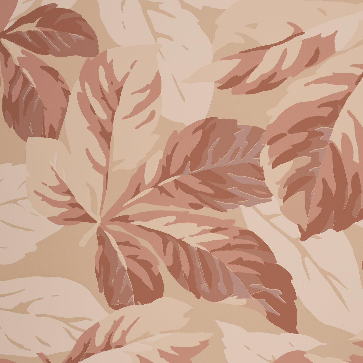 Beige and brown botanical leaf pattern on fabric, overlapping tropical leaves in warm earthy tones.
