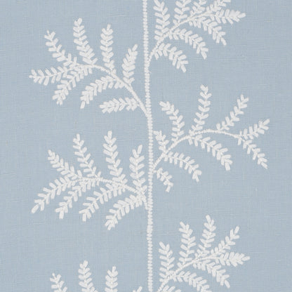 Light blue fabric with white embroidered fern leaves; decorative textile for pillows or curtains.