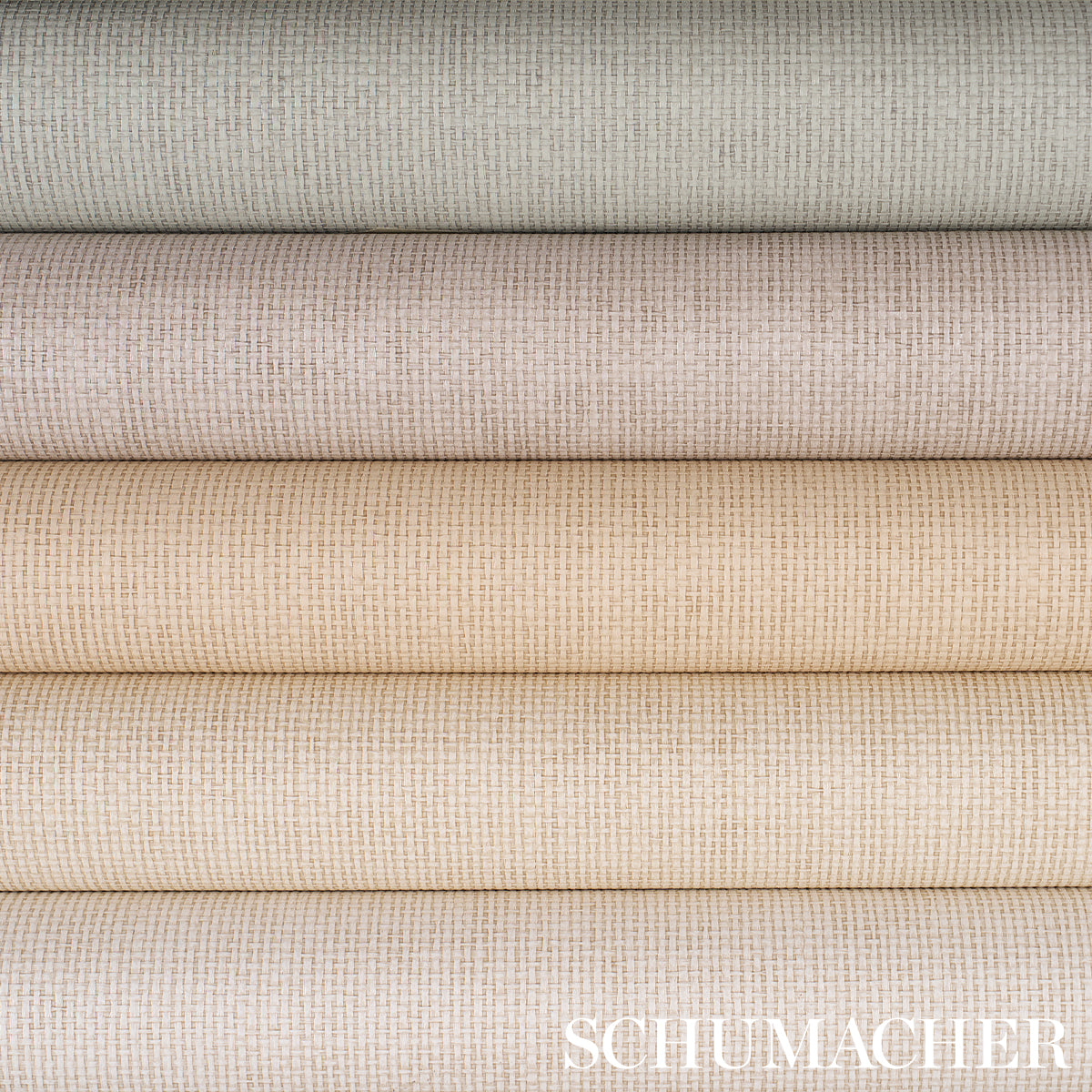 Stack of light pearl vinyl with a paperweave texture.