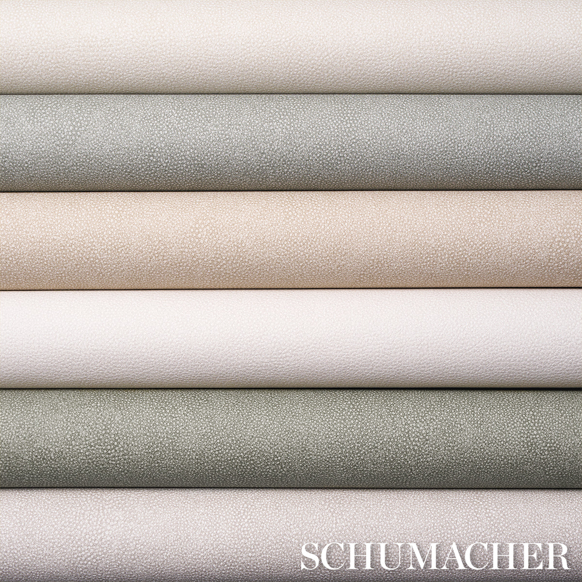 Stack of olive shagreen vinyl rolls.