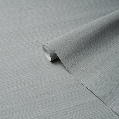 Grey metallic brushed-texture vinyl wallpaper roll, partially unrolled with subtle horizontal grain.