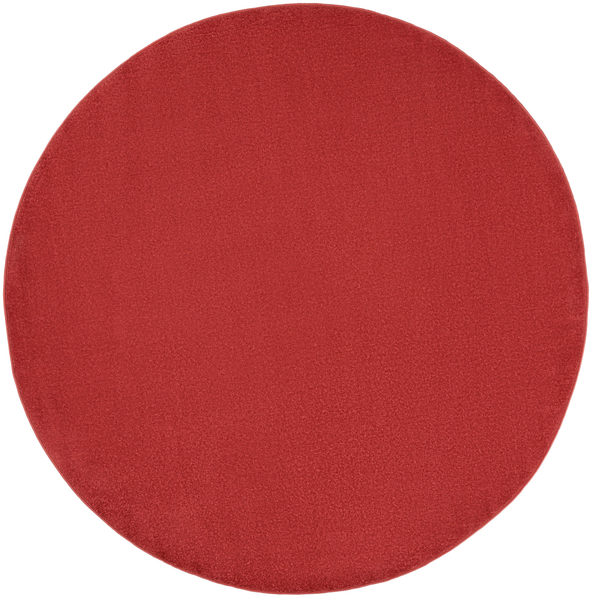 Red round felt coaster with plush texture and circular shape for drinks.