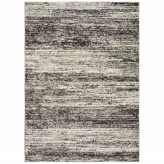 2' X 3' Gray and Ivory Abstract Power Loom Area Rug