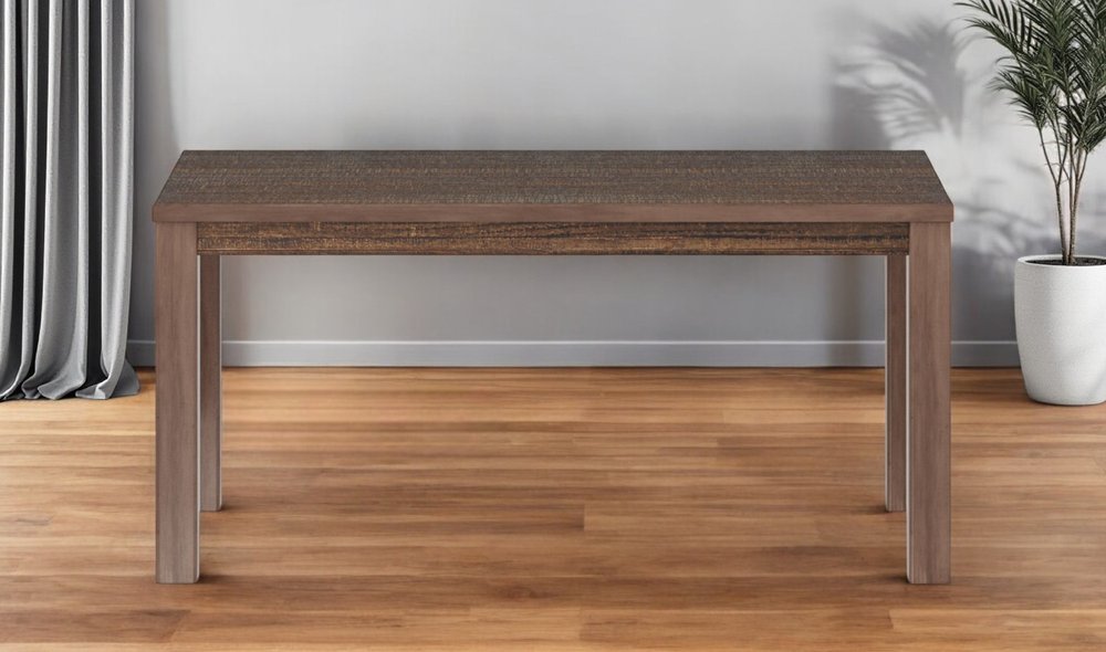 Rectangular wooden dining table with dark textured top and lighter brown chunky legs, modern minimalist style.