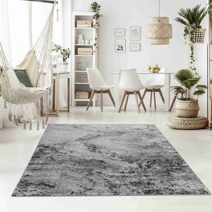 4' X 6' Gray And Black Abstract Distressed Area Rug