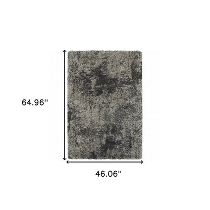 4' X 6' Black and Gray Abstract Shag Power Loom Area Rug