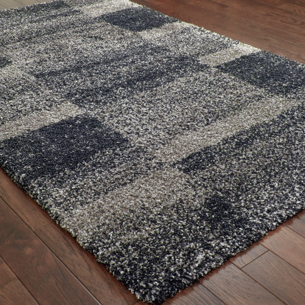 2' X 3' Charcoal Silver And Grey Geometric Shag Power Loom Stain Resistant Area Rug