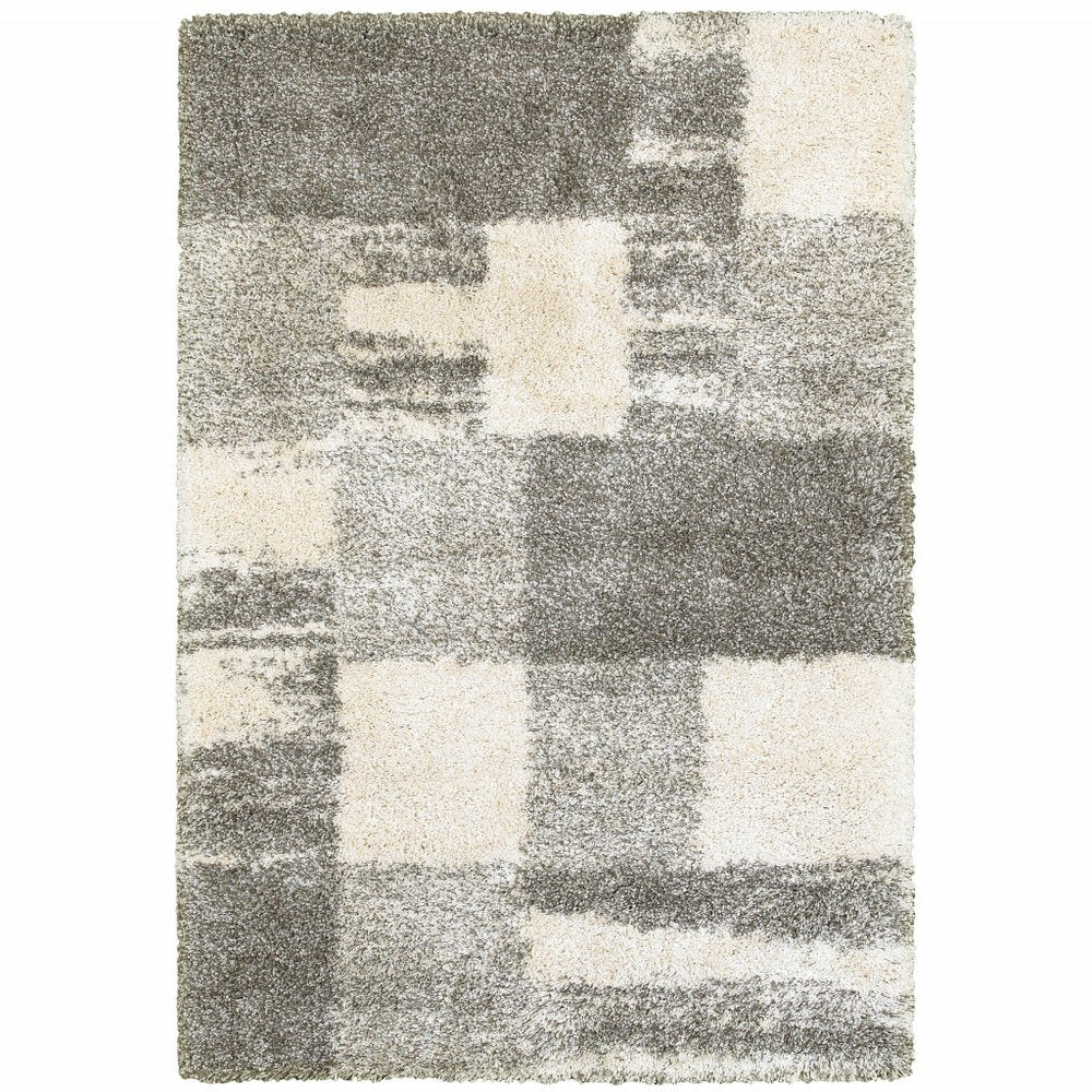 5' X 8' Gray And Ivory Abstract Geometric Shag Area Rug