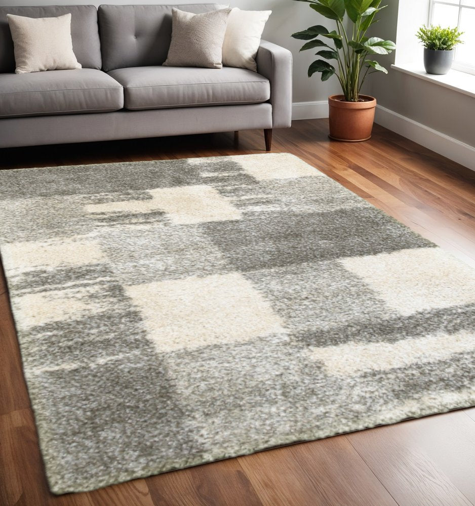5' X 8' Gray And Ivory Abstract Geometric Shag Area Rug