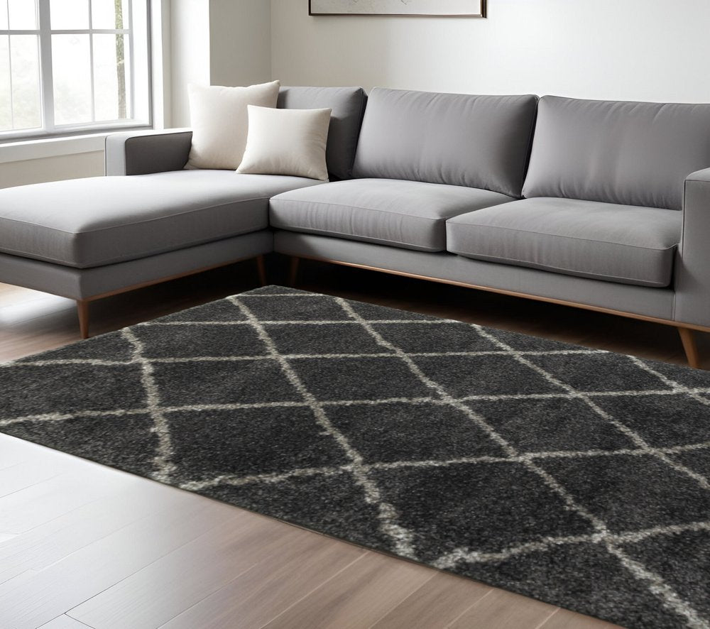 6' X 9' Charcoal And Grey Geometric Shag Power Loom Stain Resistant Area Rug