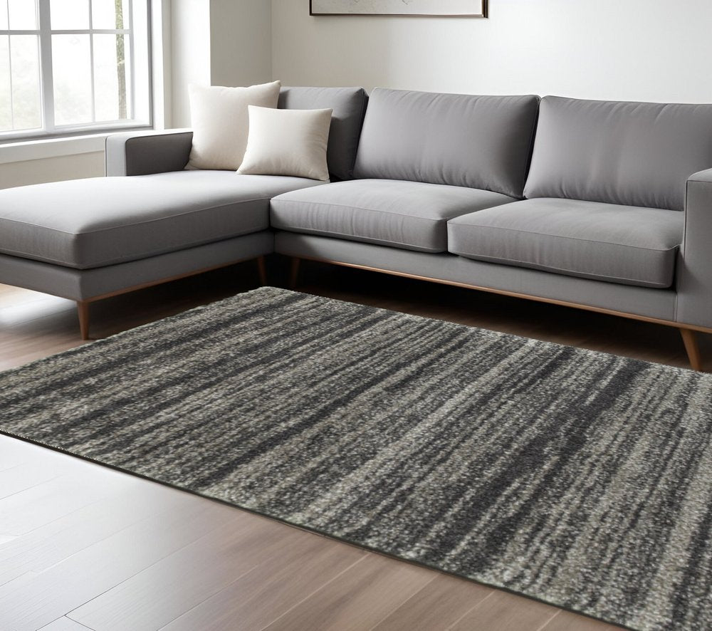 6' X 9' Charcoal Silver And Grey Geometric Shag Power Loom Stain Resistant Area Rug