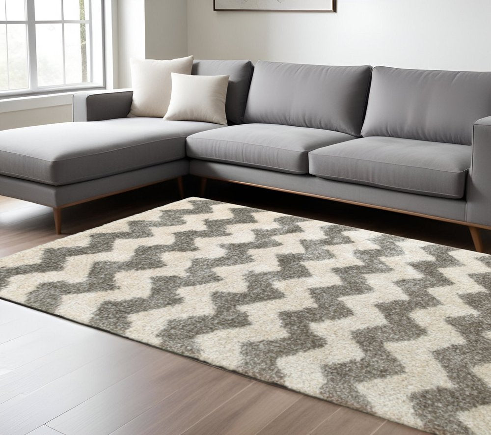 6' X 9' Grey And Ivory Geometric Shag Power Loom Stain Resistant Area Rug