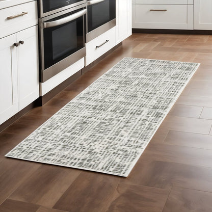 2' X 8' White And Grey Abstract Power Loom Stain Resistant Runner Rug