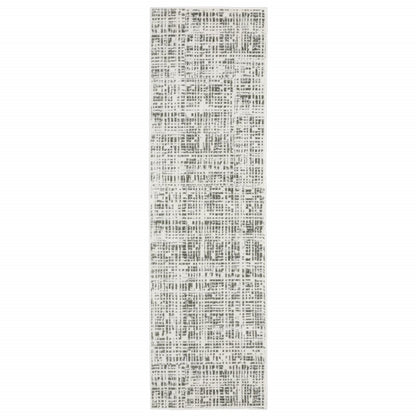 2' x 8' white and grey abstract power loom stain resistant runner rug