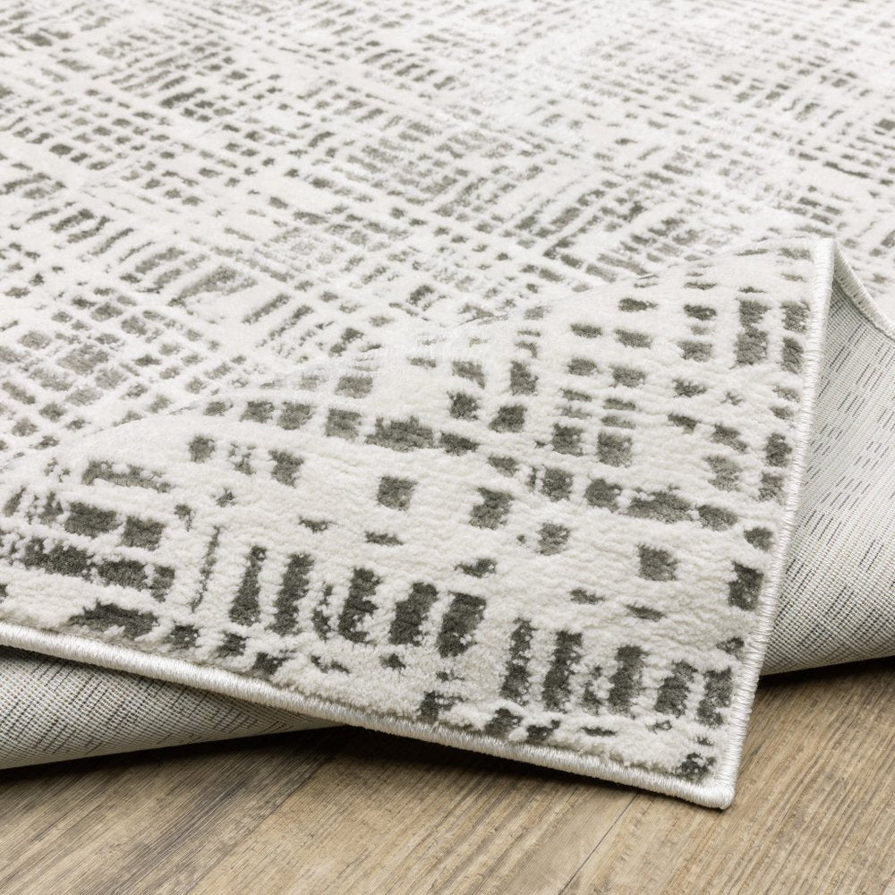 2' X 8' White And Grey Abstract Power Loom Stain Resistant Runner Rug