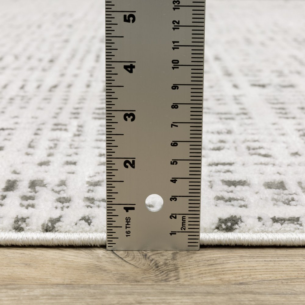 2' x 8' white and grey abstract power loom stain resistant runner rug
