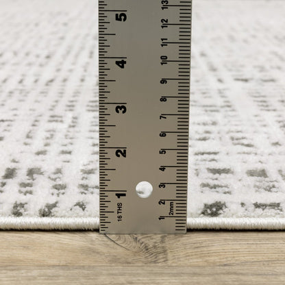 2' x 8' white and grey abstract power loom stain resistant runner rug