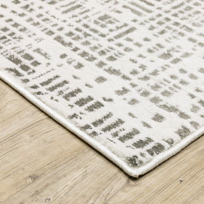 7' X 10' White And Gray Abstract Distressed Area Rug