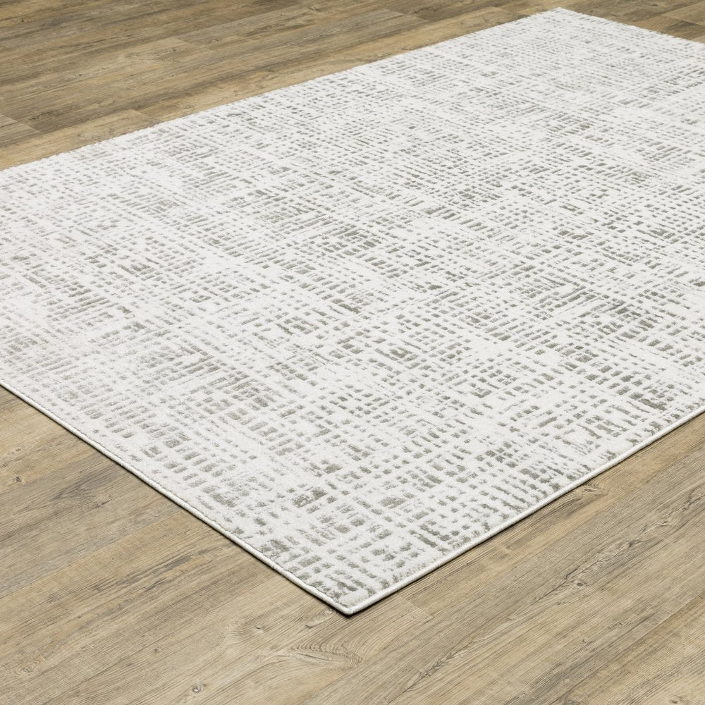 7' X 10' White And Gray Abstract Distressed Area Rug
