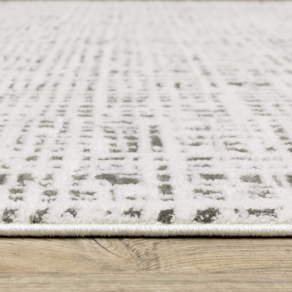 7' X 10' White And Gray Abstract Distressed Area Rug