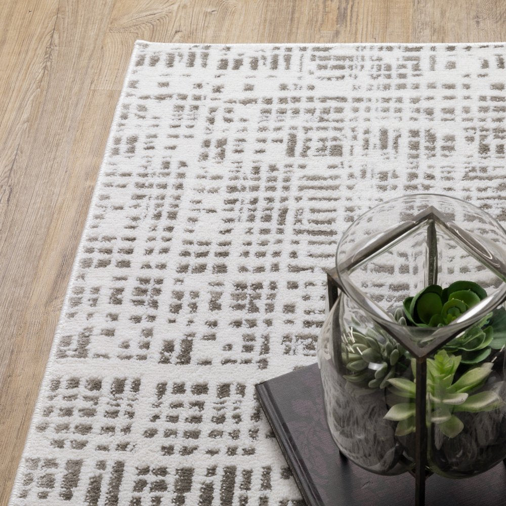 7' X 10' White And Gray Abstract Distressed Area Rug
