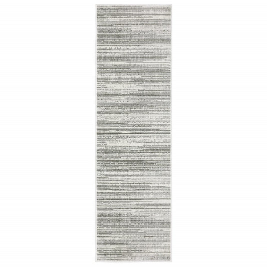 2' x 8' white and grey abstract power loom stain resistant runner rug