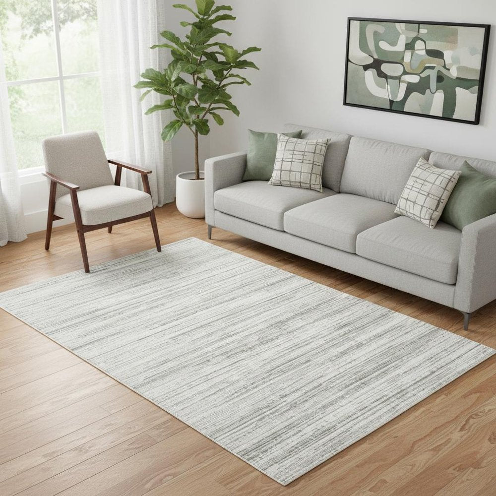 5' X 8' White And Grey Abstract Power Loom Stain Resistant Area Rug