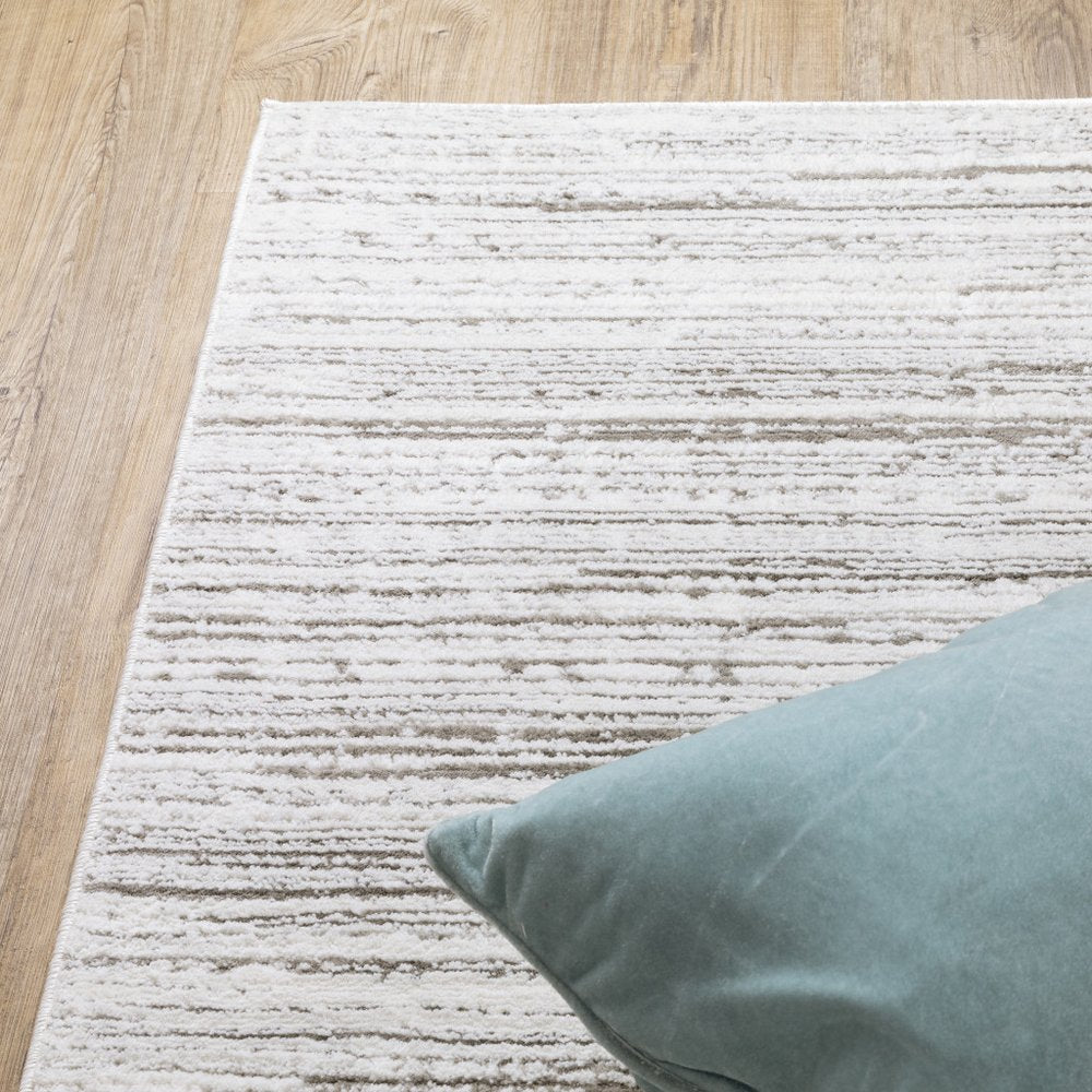 5' x 8' white and grey abstract power loom area rug, stain resistant