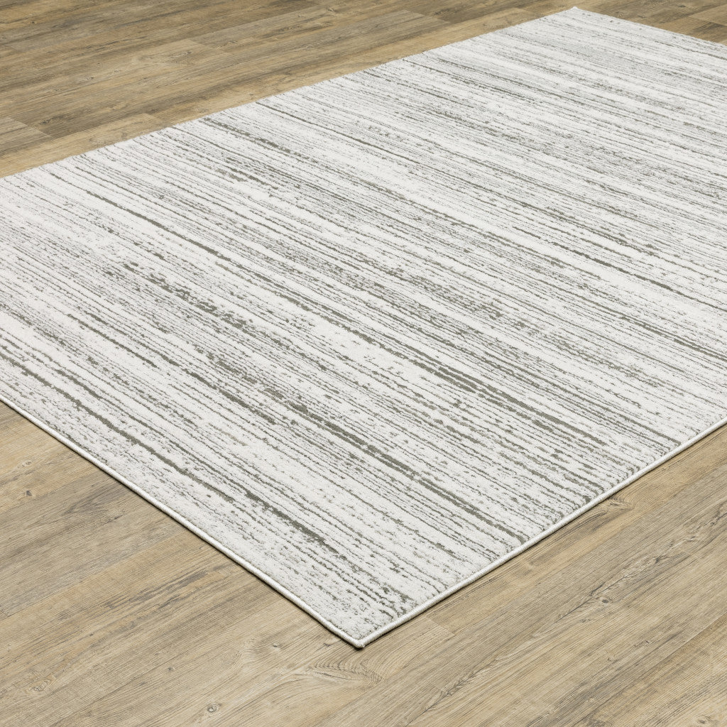 6' X 9' White And Grey Abstract Power Loom Stain Resistant Area Rug
