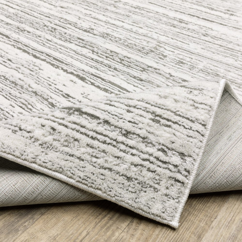 10' X 13' White And Gray Abstract Distressed Area Rug