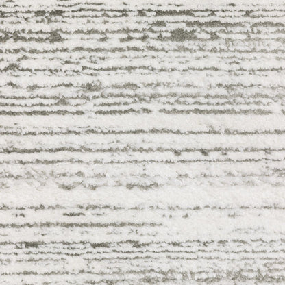 10' X 13' White And Gray Abstract Distressed Area Rug