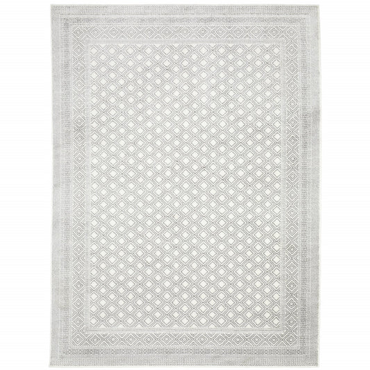 5' X 8' White And Grey Oriental Power Loom Stain Resistant Area Rug