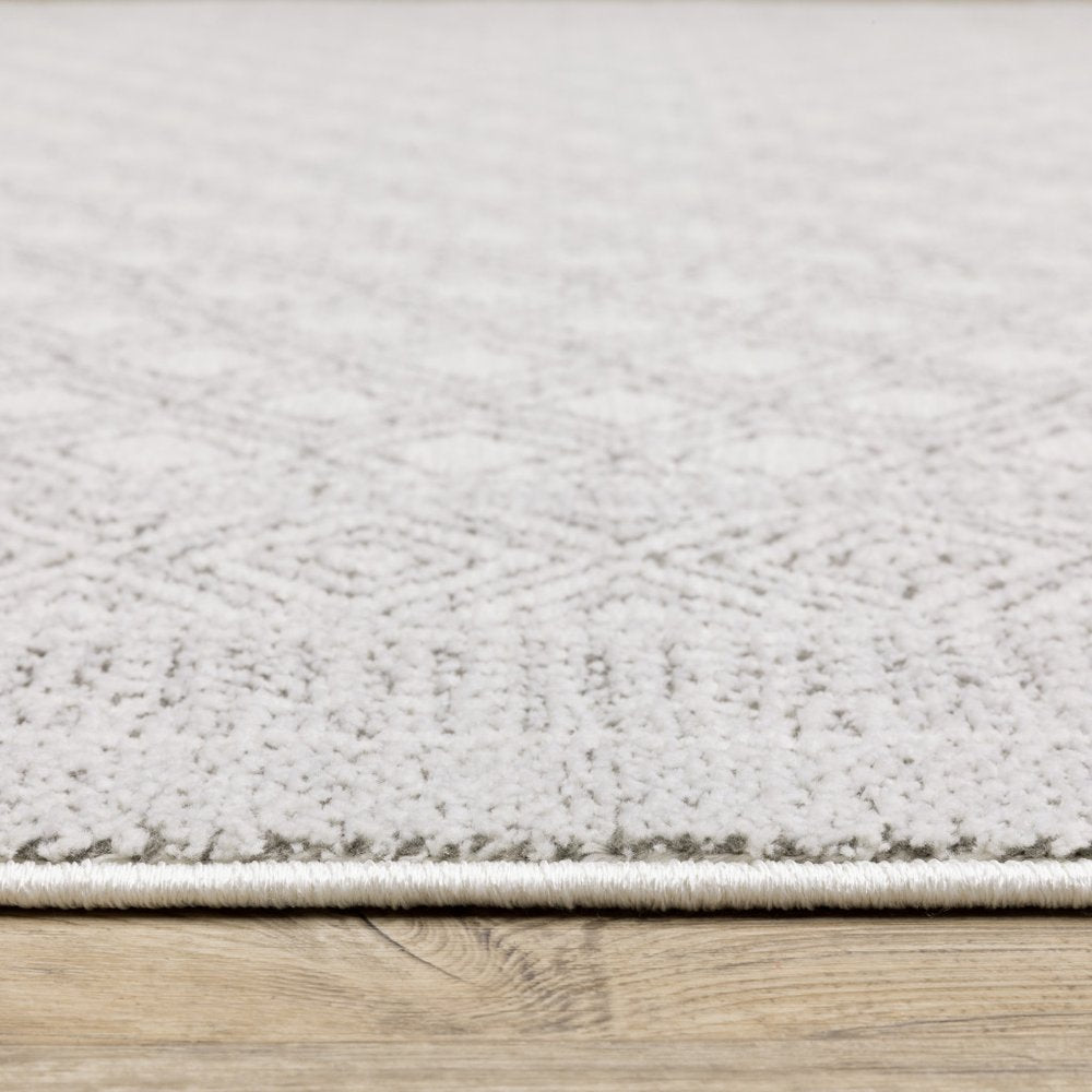 5' X 8' White And Grey Oriental Power Loom Stain Resistant Area Rug