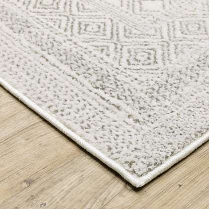 7' X 10' White And Gray Oriental Distressed Area Rug