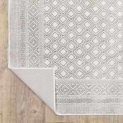 7' X 10' White And Gray Oriental Distressed Area Rug